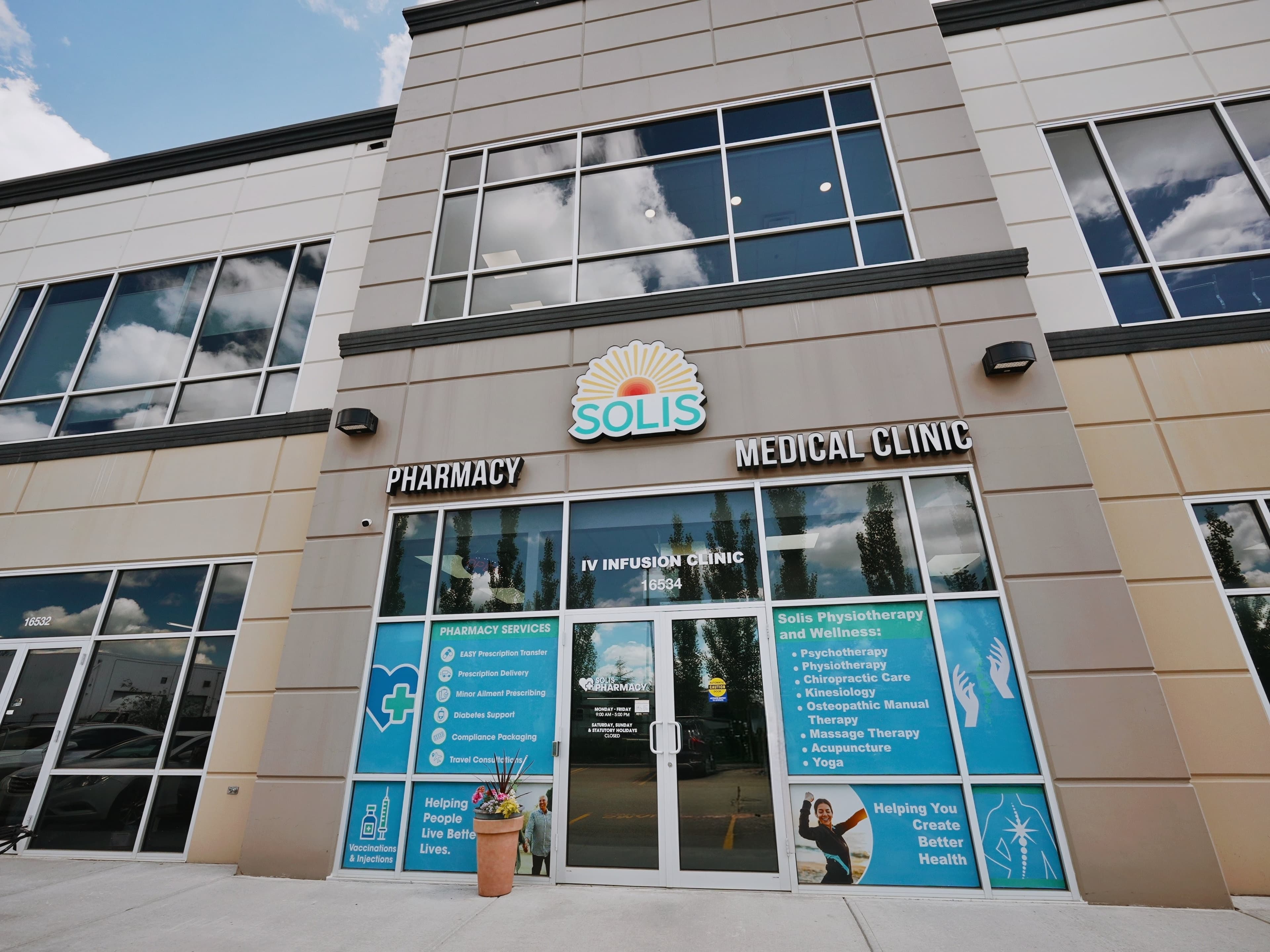 Main Solis Medical Clinic entrance with the Solis sign and doors marked 16534